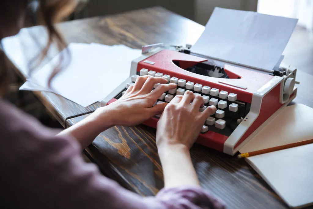 writer working on typewriter
