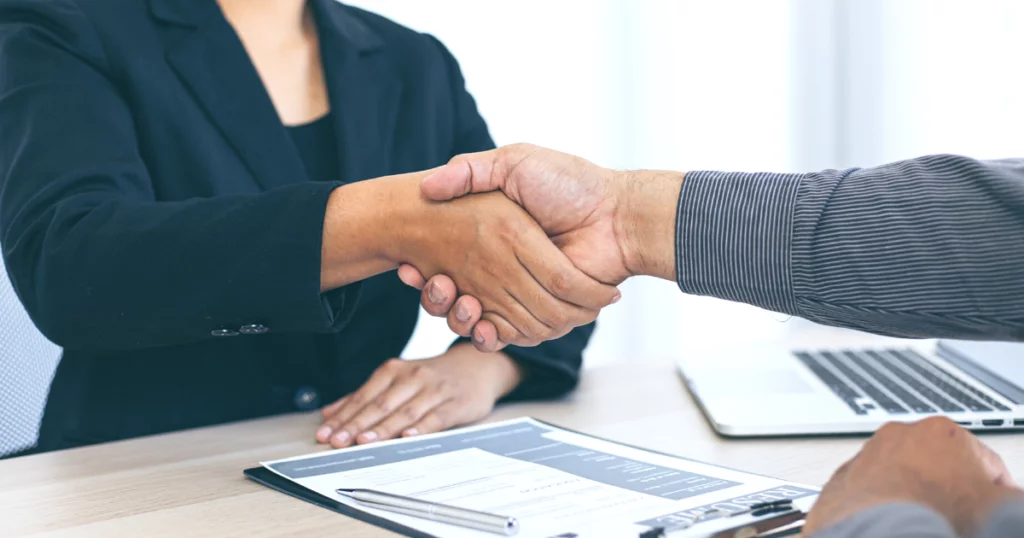 Things to say in an interview hiring manager shaking hands