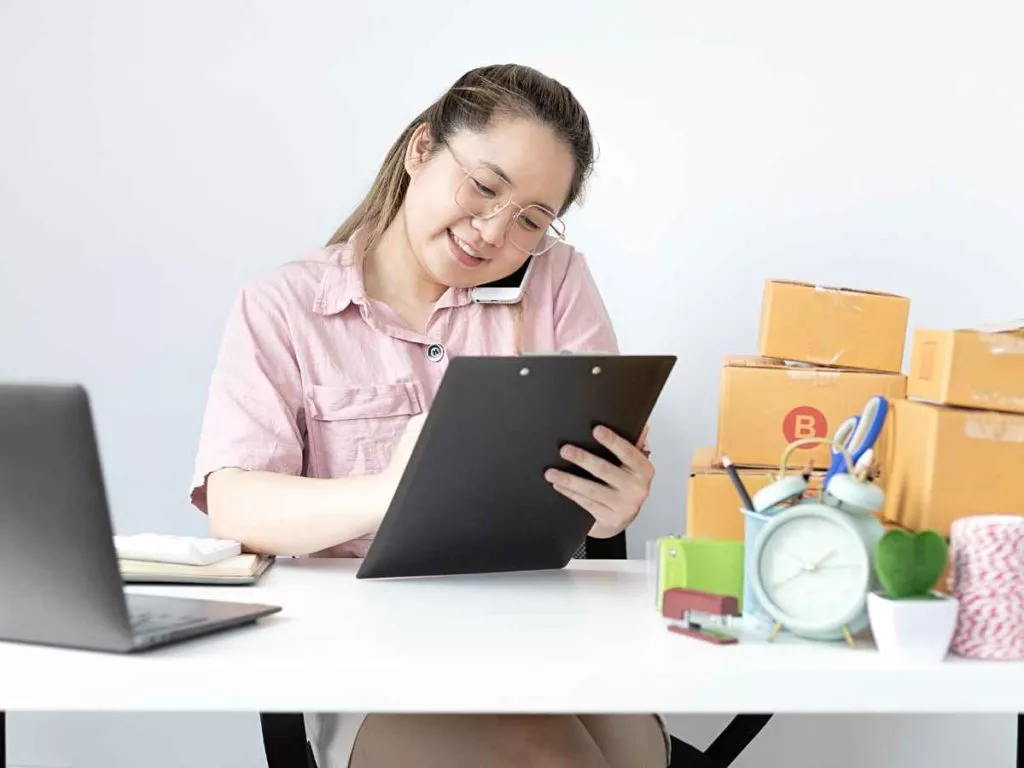 Productivity Tips For Entrepreneurs Working on Desk Boxes Laptop