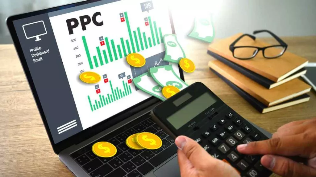 ppc strategy laptop calculator coins money
