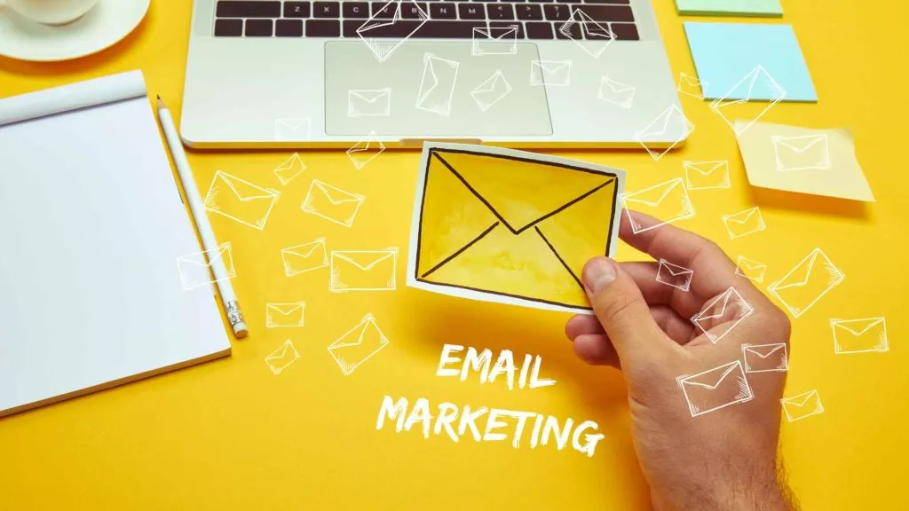 email marketing - hand holding envelope