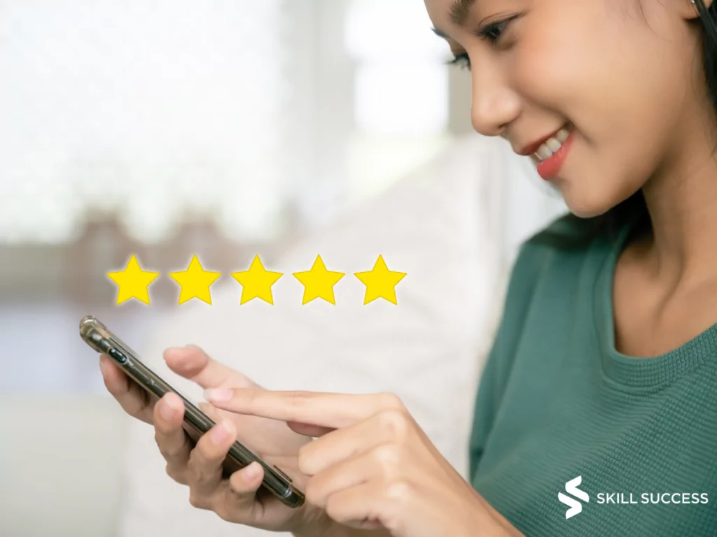 a happy customer giving 5-star review on her phone