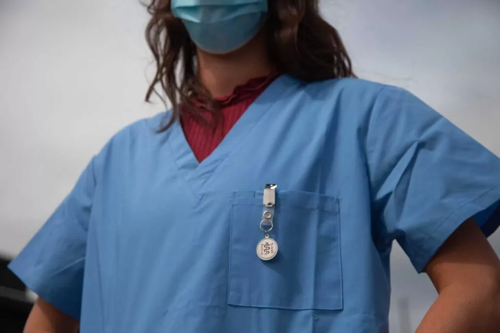 nurse wearing blue scrubs