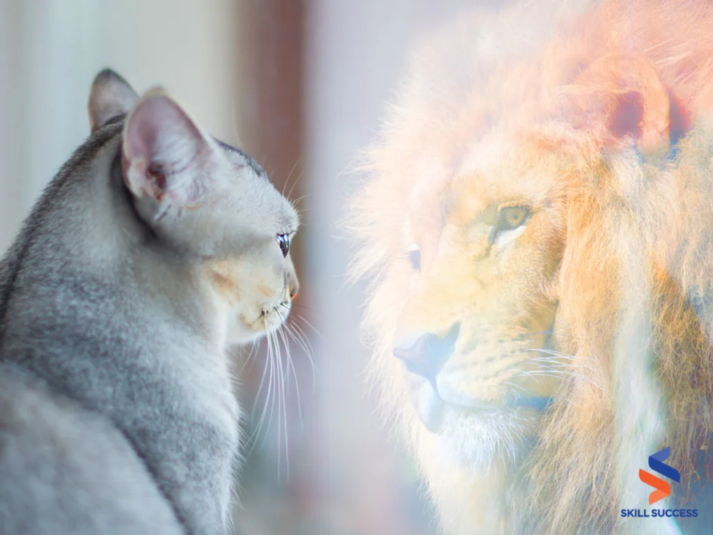 a cat observing a majestic lion, symbolizing the concept of self-development