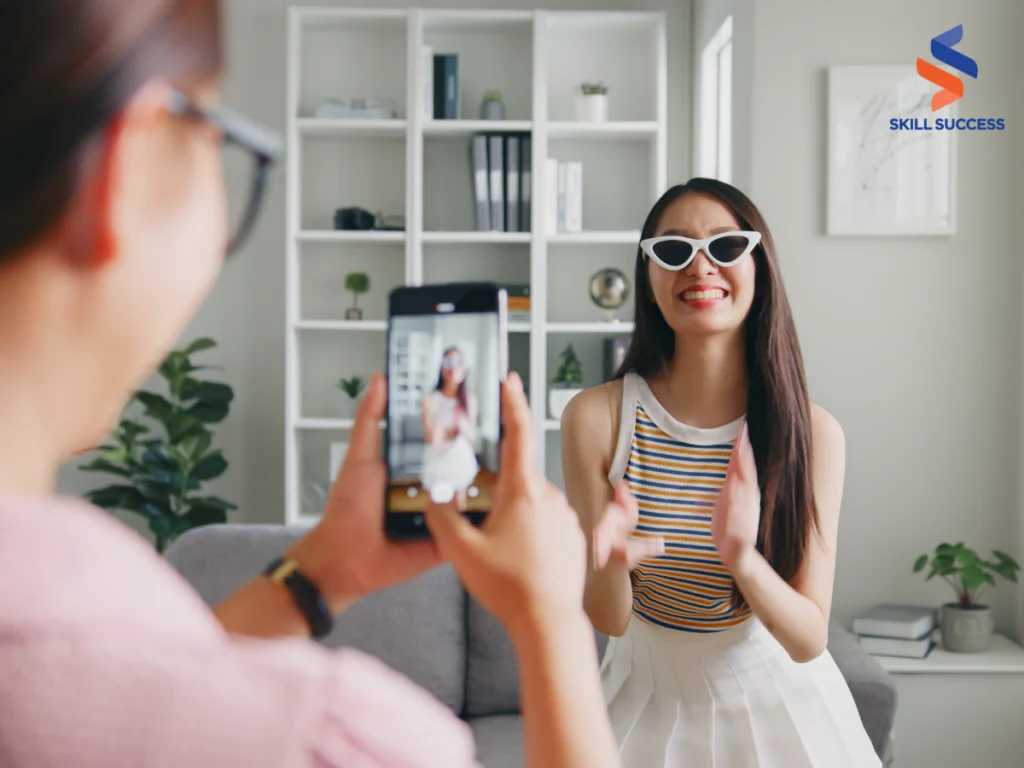 a photo of a woman recording a video for youtube